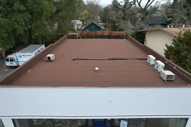 flat red roof Ac white house
