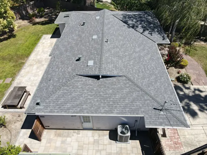 Newly installed residential roofs under sunny skies in Walnut Creek by Apollo Roofing Company