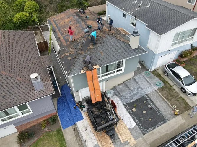 Shingle roof installation by Apollo Roofing Company workers in Walnut Creek, California – expert residential roofing services