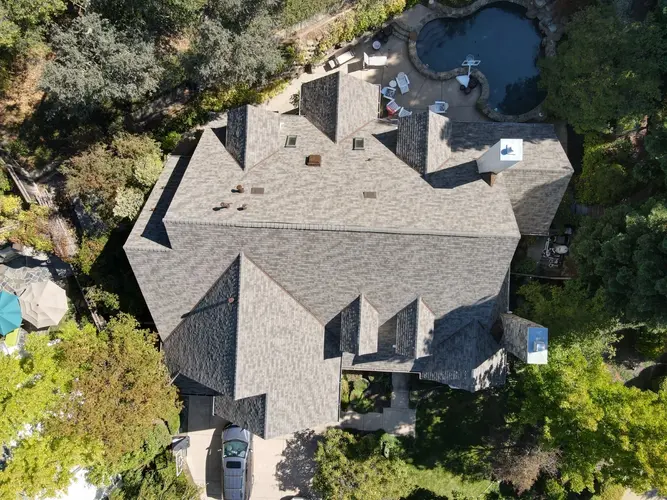 Top-down image of asphalt shingle roofing by Apollo Roofing in Novato
