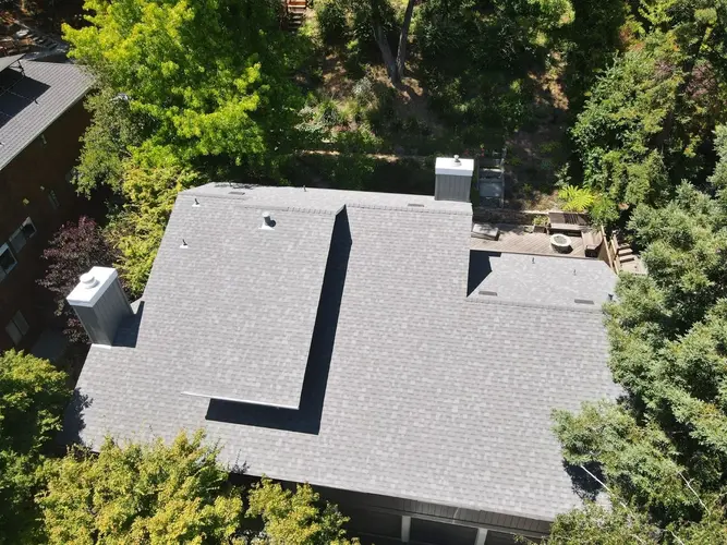 Top-down view of new CertainTeed asphalt shingle roof surrounded by trees in San Francisco