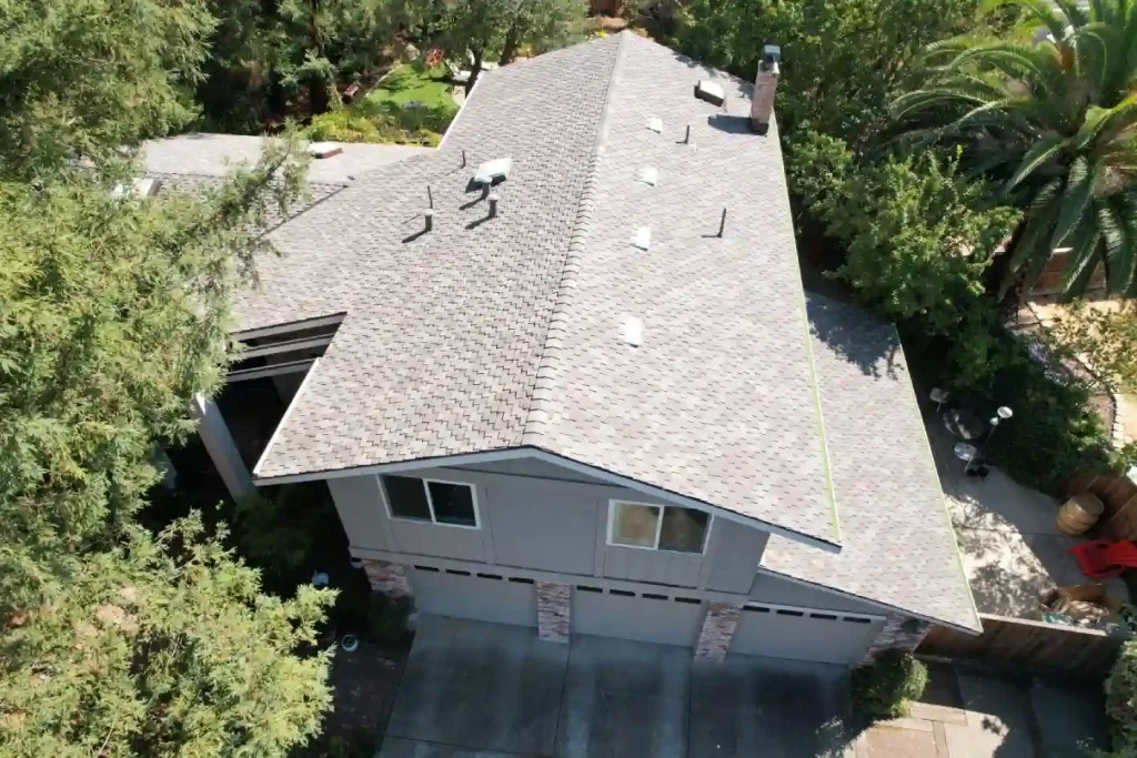 Residential rooftop from above after professional roof repair