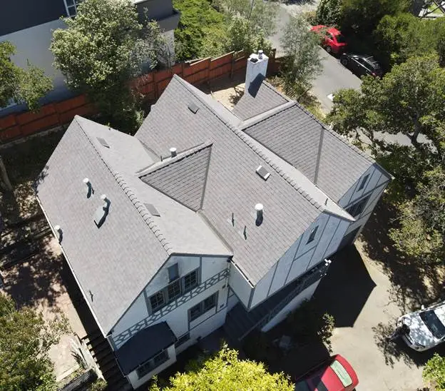 red car triangle house trees