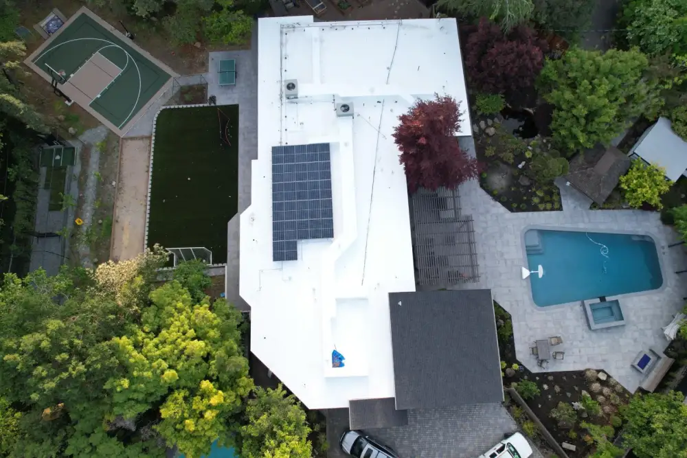 Rooftop view of GAF Solar shingle roofs in San Jose with solar array