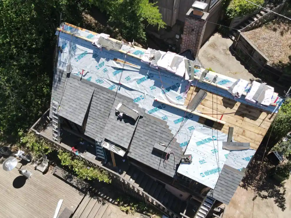 Professional contractor installing new residential roof in Sacramento