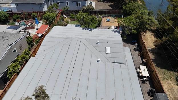 gray flat commercial roof metel car