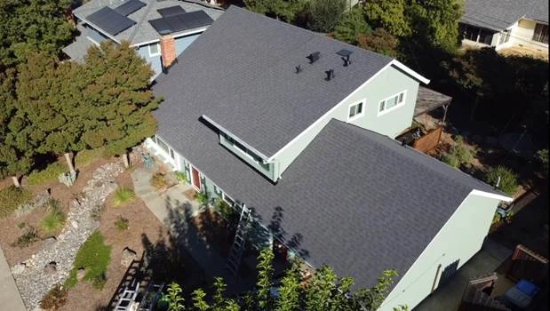 two big house gray roof hall white