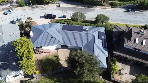 blue and brown roof house cars