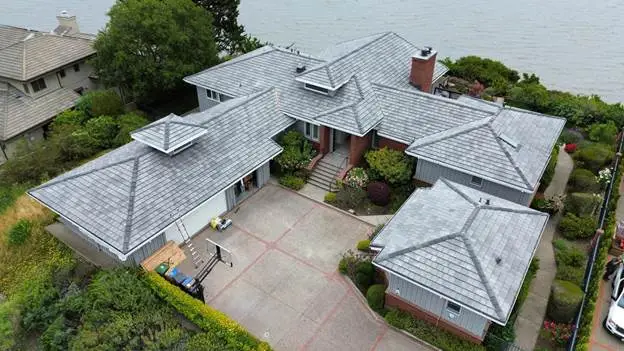 gray roof house sea facing with basketball court
