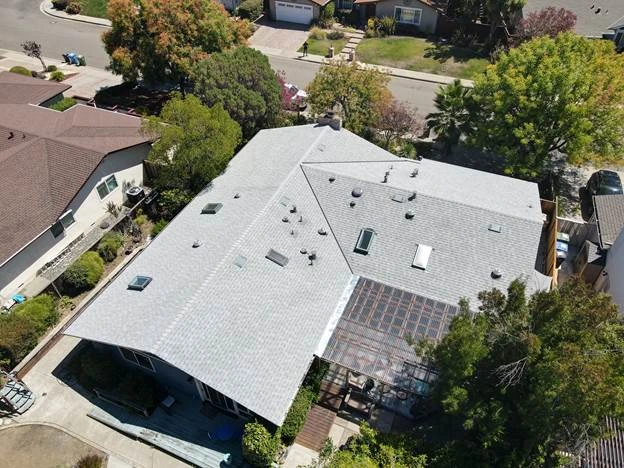l shape white roof house