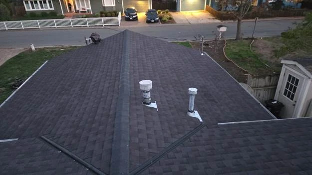 white pipes on black roof cars