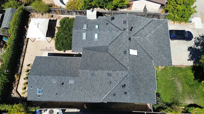 Asphalt shingle roof replacement gray roof blue purple car