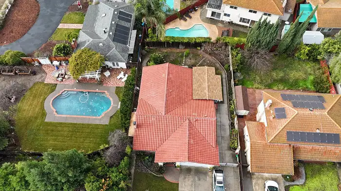 red roof house with swimming pool