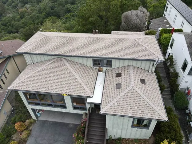 brown roof white house forest