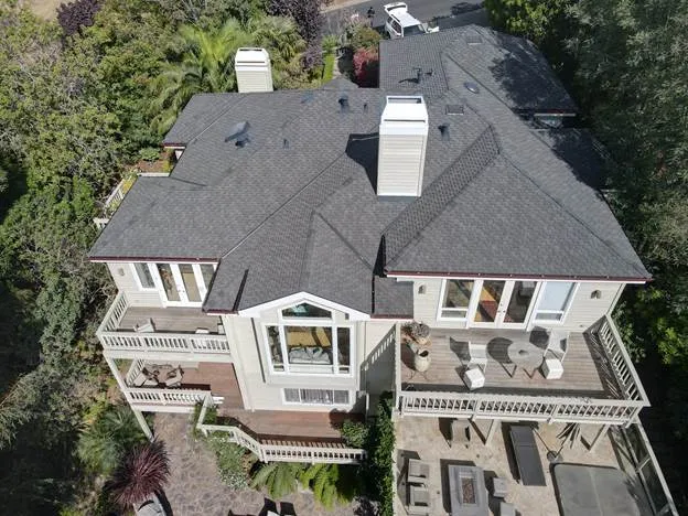 Big house forest trees car